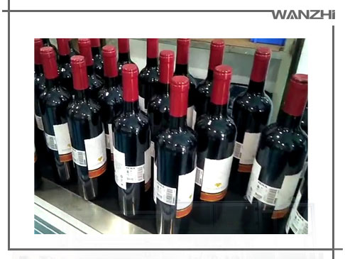 全自動紅(hóng)酒(jiǔ)定位貼標機_ 紅酒自動(dòng)貼標機_東莞市草莓视频在线观看18自動化科技有限公司