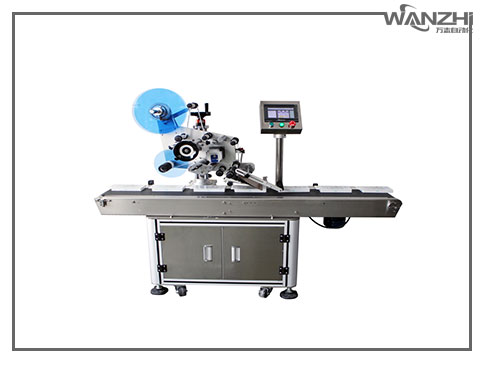 手機電池貼標機；平麵貼標機；貼標機廠家