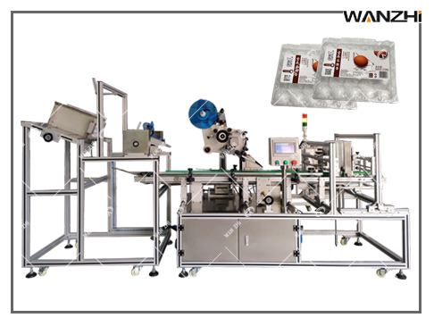 吸塑盒（hé）貼標機,水果盒貼標機,塑料（liào）盒不幹膠（jiāo）貼標機